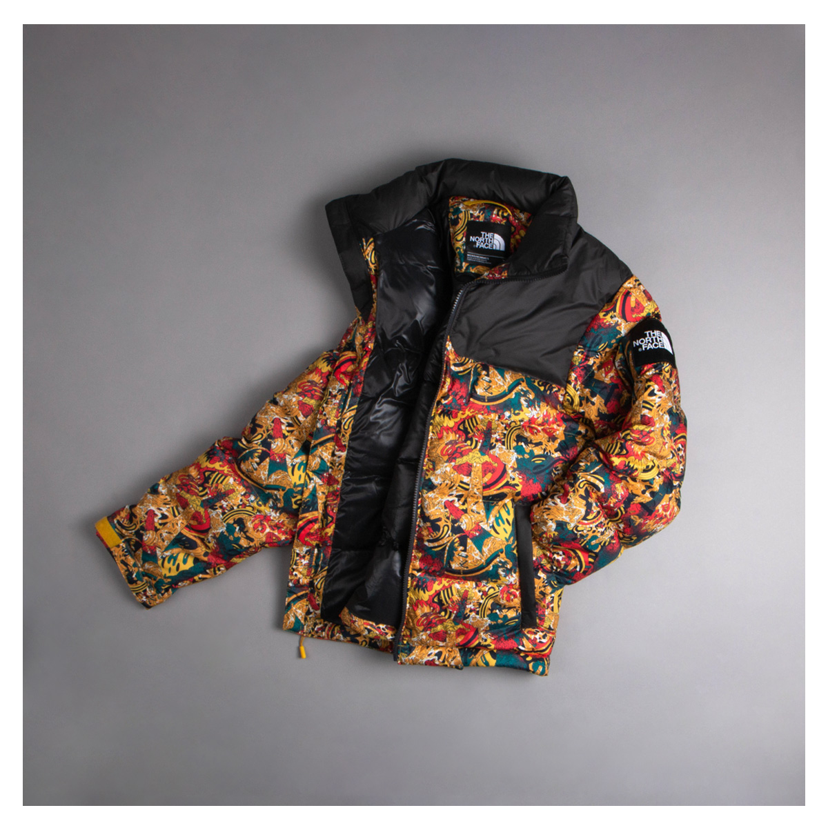 A North Face Coat In Bright Floral Patterns